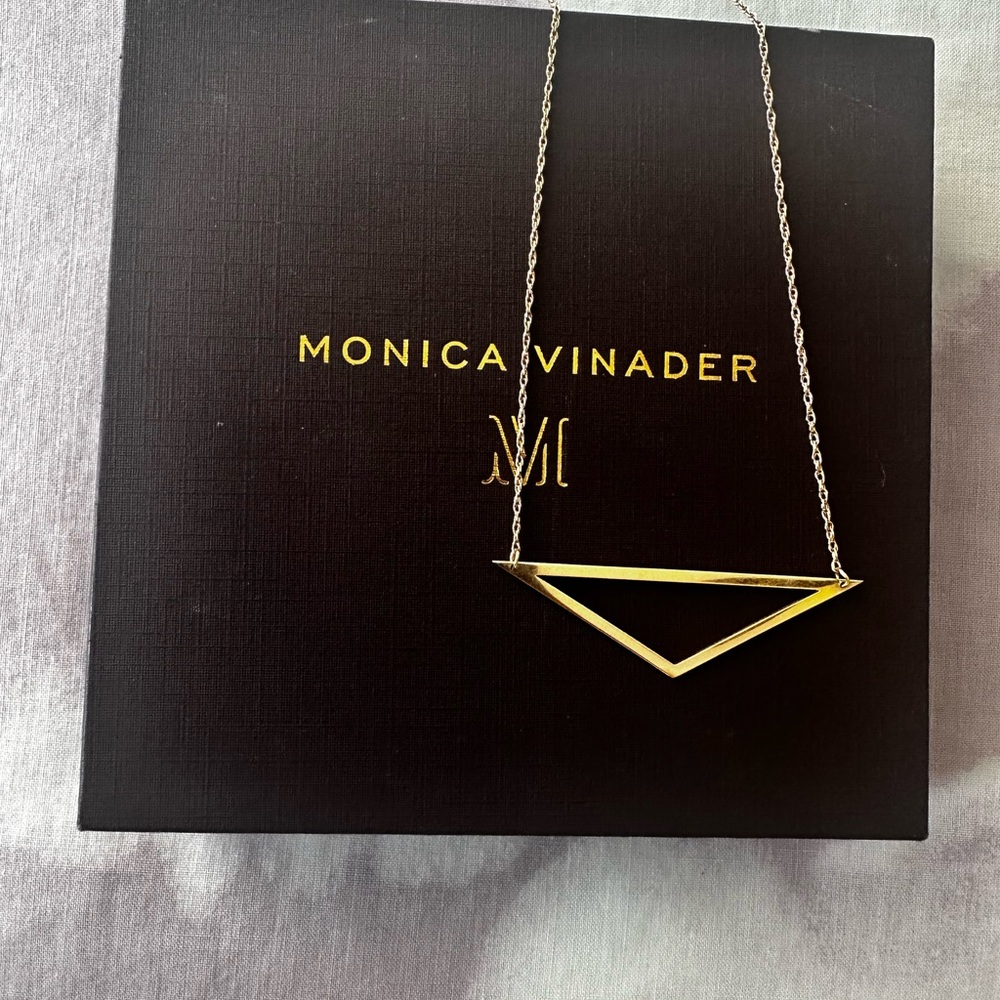 Monica Vinader necklace with obtuse triangle attached pendant in gold